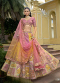 Multicolor silk bridal lehenga with embroidered blouse and lacework dupatta