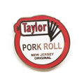 Taylor Pork Roll enamel pin with high-contrast detail, perfect for denim jackets and backpacks.