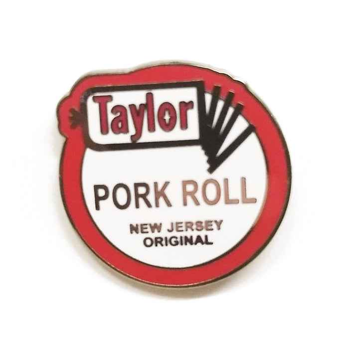 Taylor Pork Roll enamel pin with high-contrast detail, perfect for denim jackets and backpacks.