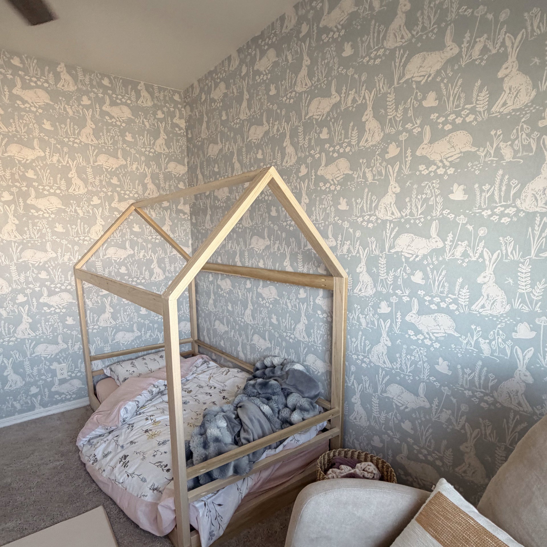 Thumper wallpaper pattern by Hufton Studio on a clean interior wall