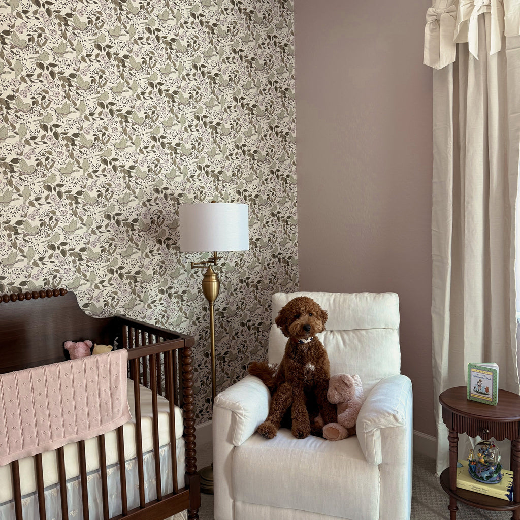 Lilla floral wallpaper with sage-green, pale-pink, and cream tones in a traditional cottagecore style.
