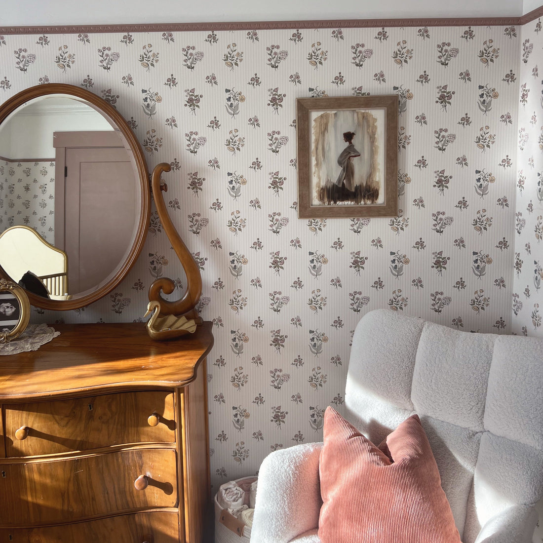 Cosie floral wallpaper featuring a vintage-inspired palette of cream, pale pink, sage green, and muted blue.