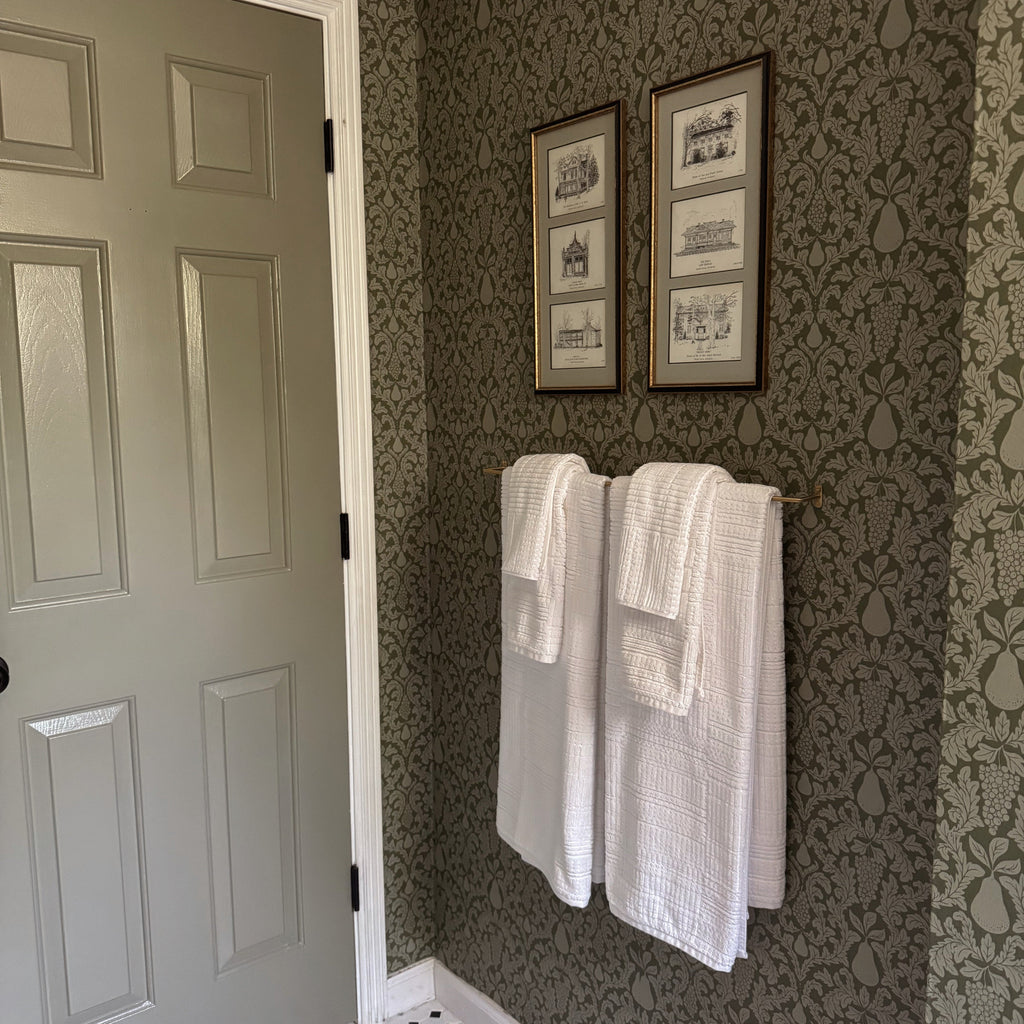 Felipe botanical wallpaper in shades of olive and sage green