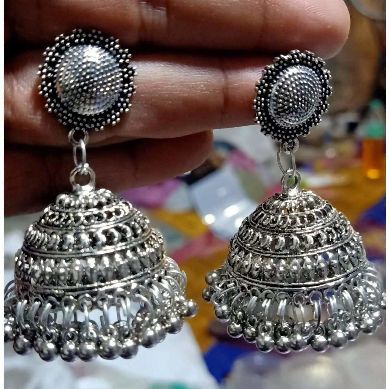 Oxidized silver-tone brass Jhumki earrings with traditional detailing