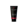 A 2.5 OZ container of Sandalwood Shaving Cream by The Art Of Shaving for a smooth grooming experience.