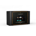 A 3-element beard prep kit containing beard wash, conditioner, and sandalwood oil in a black travel bag.