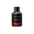 The Art of Shaving Sandalwood Pre-Shave Oil bottle in green, black, and red packaging.