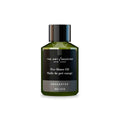 Bottle of The Art of Shaving Unscented Pre-Shave Oil, 2 fl oz, featuring green and black labeling.