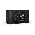 Unscented men's shaving kit including pre-shave oil, cream, brush, and balm in black and white packaging.