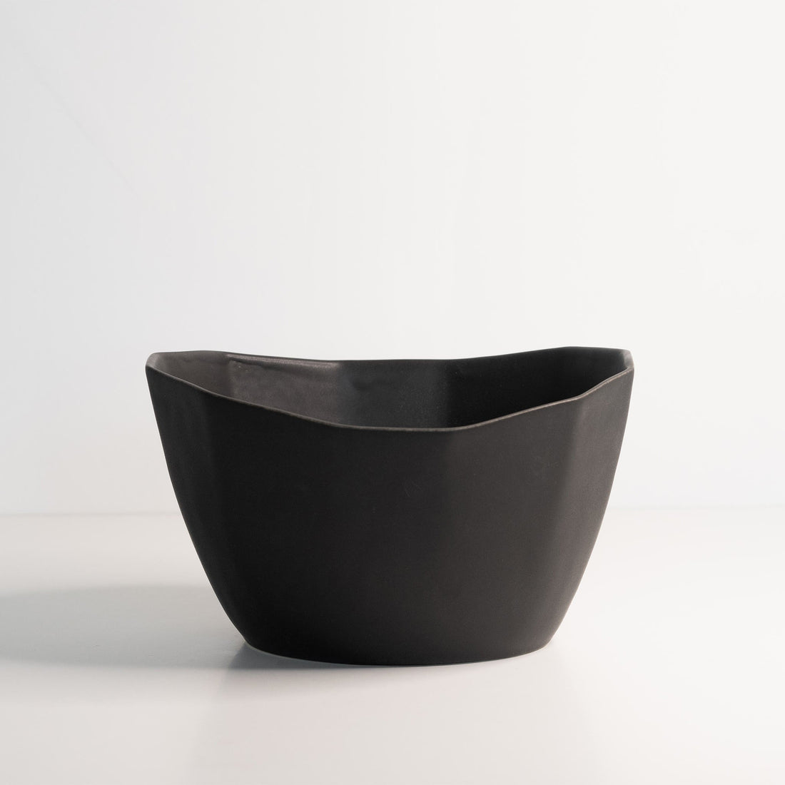 Medium Handmade Porcelain Nesting Bowl in Matte Black - Image 4