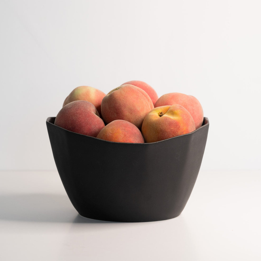Medium Handmade Porcelain Nesting Bowl in Matte Black - Image 2