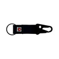 Monochromatic black leather keychain clip featuring a small red icon logo, industrial minimalist design.