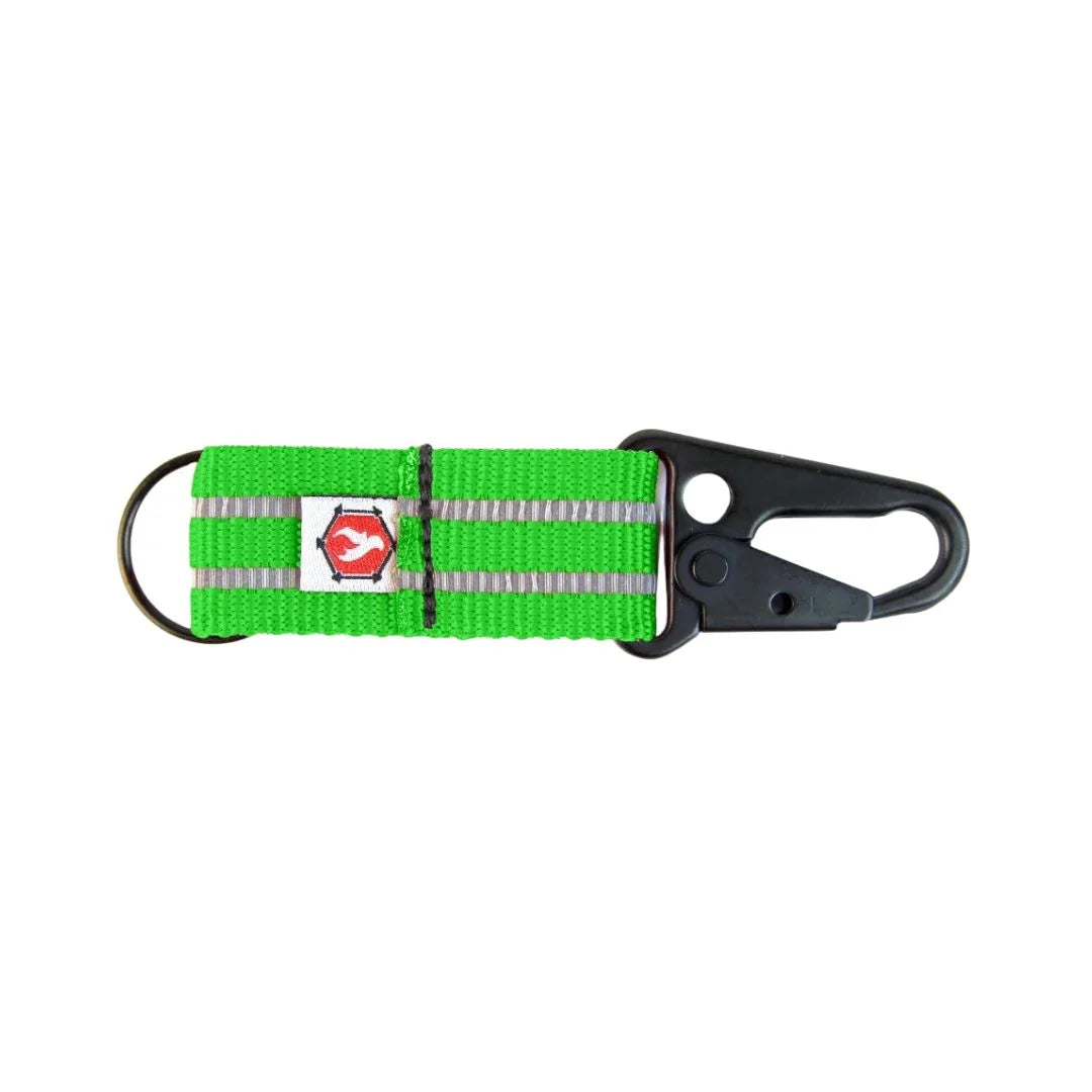 The Chauffeur reflective keychain clip in black polyester against a neutral background.