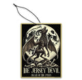 Jersey Devil Beast of the Pines air freshener hanging in a car, featuring cryptid artwork