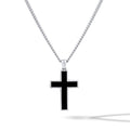 Black Onyx Stone Cross Pendant featuring sharp silver lines worn as a minimalist necklace.