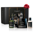 The Art of Shaving unscented 3-piece grooming kit in minimalist black and white packaging.