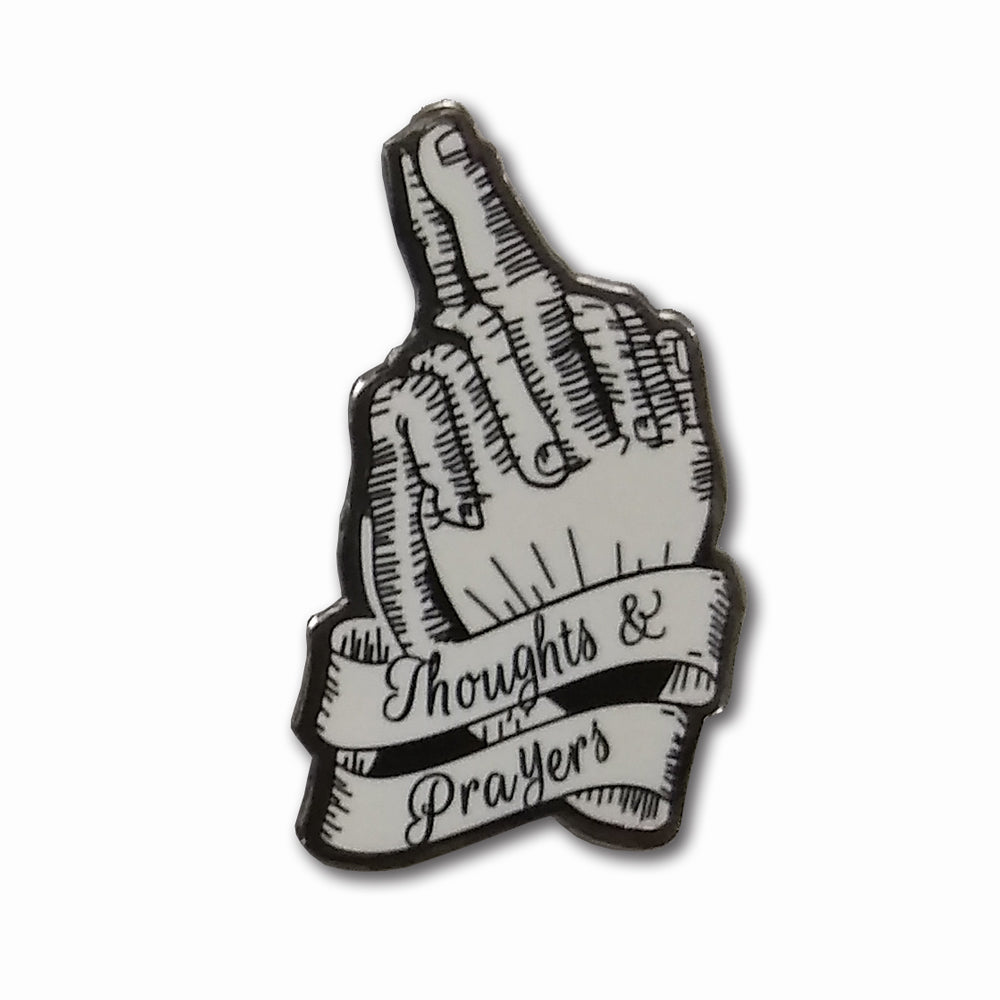 Thoughts and Prayers enamel pin with butterfly clasp backer on a neutral background