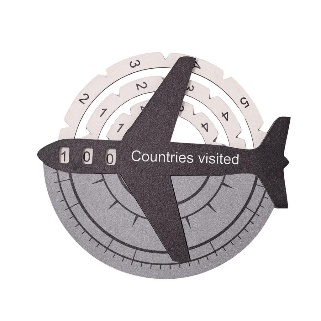 A minimalist fiberwood 3D world map mounted on a wall for travel tracking.