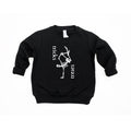 Child wearing a black Tricks & Treats pullover with gothic-style graphic