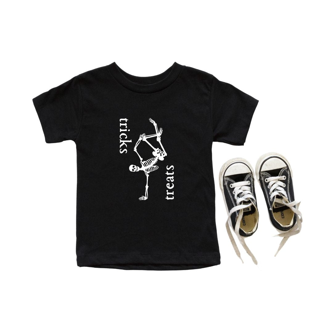 Kids unisex graphic t-shirt with Tricks & Treats design in black and white