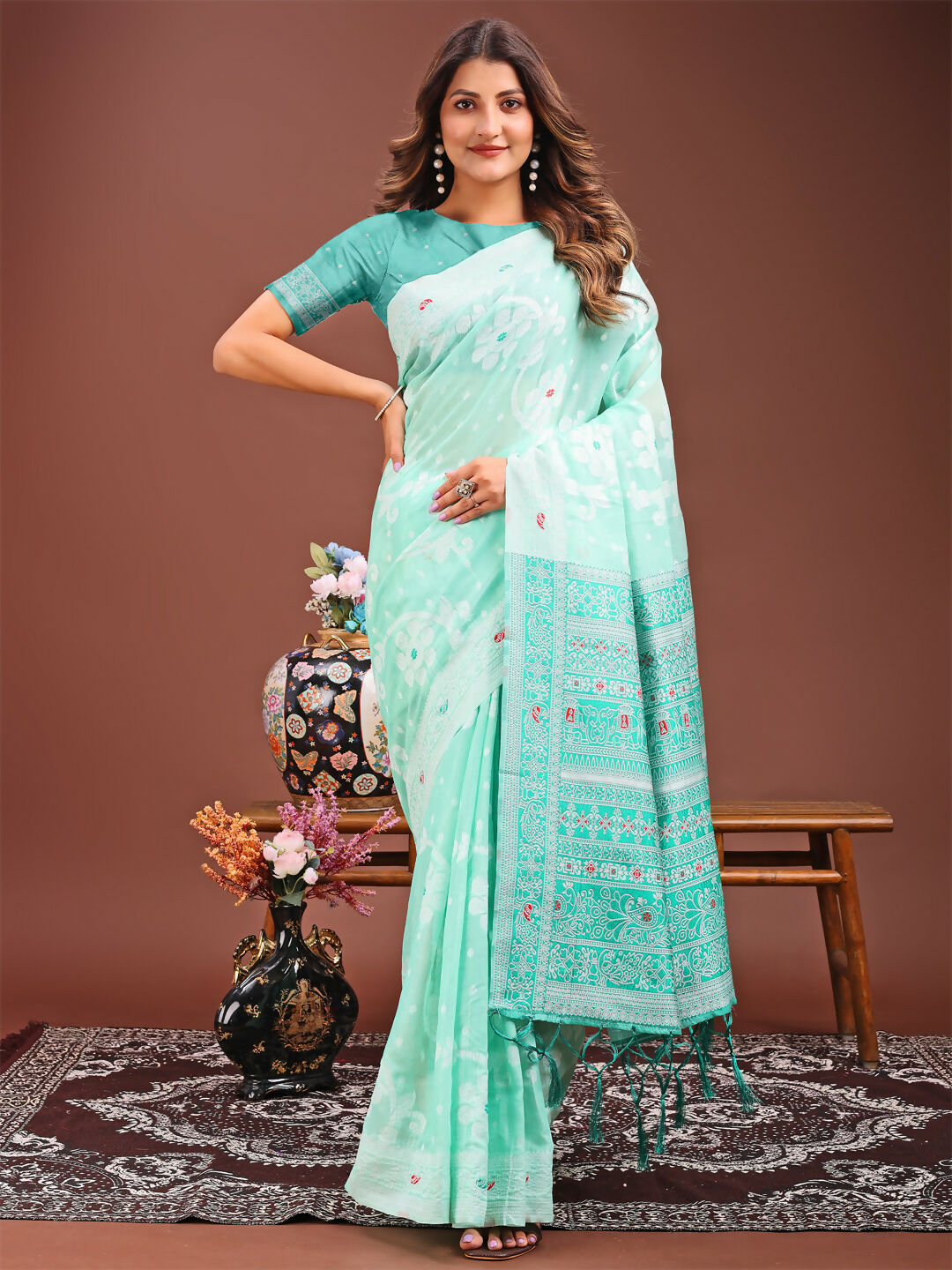 Sea Green Linen Cotton Saree with matching blouse piece draped elegantly.