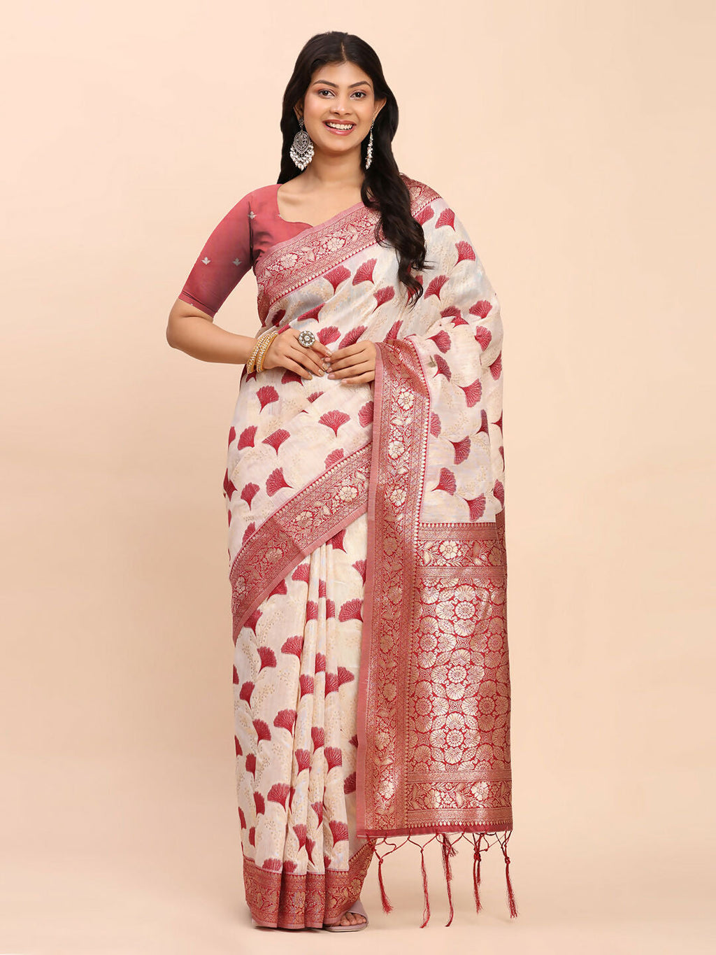 A deep maroon linen cotton saree with a matching blouse piece.
