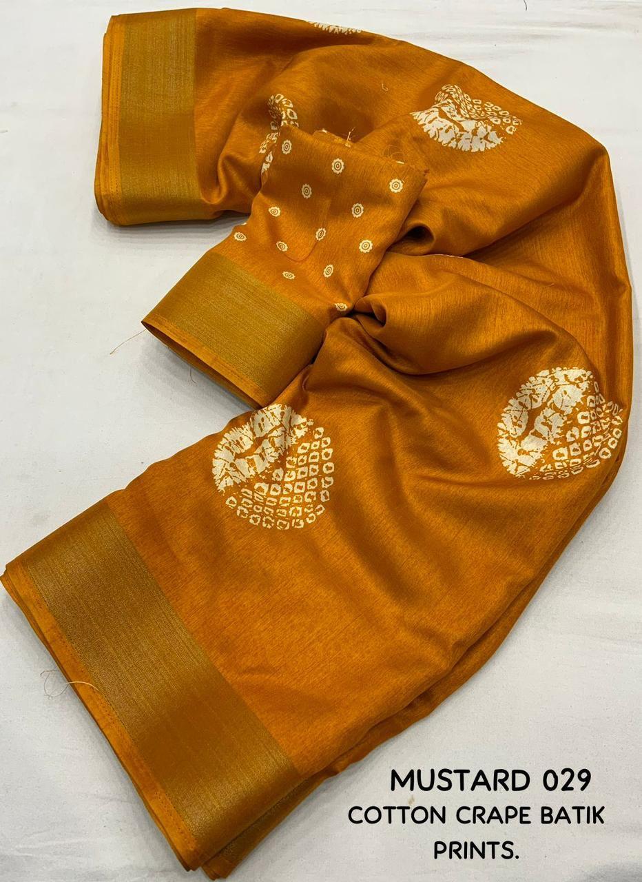 Mustard Cotton Crepe Saree with Batik Print and Zari Border