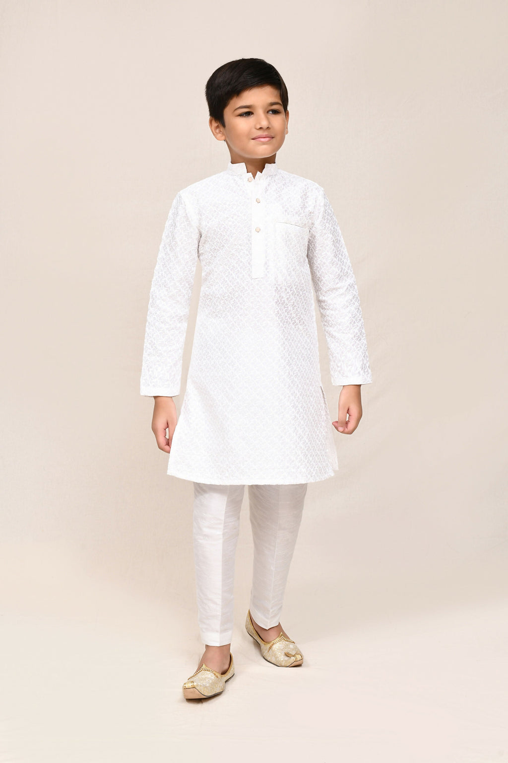 Elegant white art silk kurta paired with matching straight fit trousers