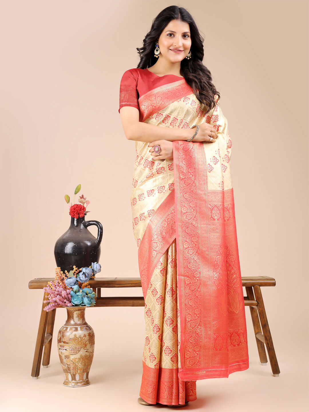 Cream and Red Banarasi Silk Saree with matching blouse piece.