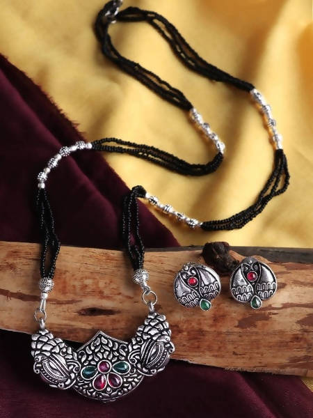Close-up of Mominos Fashion Johar Kamal oxidised silver mangalsutra with multicolor oval stones and black beads