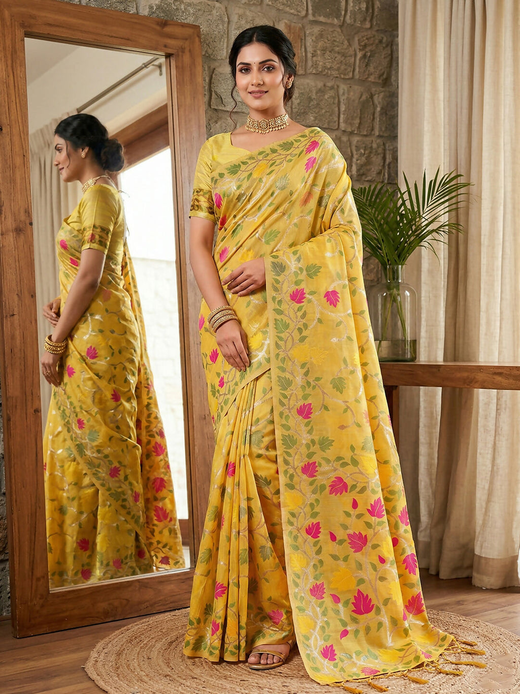 Vibrant yellow linen cotton saree with matching blouse piece displayed in a flat lay style.