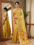 Vibrant yellow linen cotton saree with matching blouse piece displayed in a flat lay style.