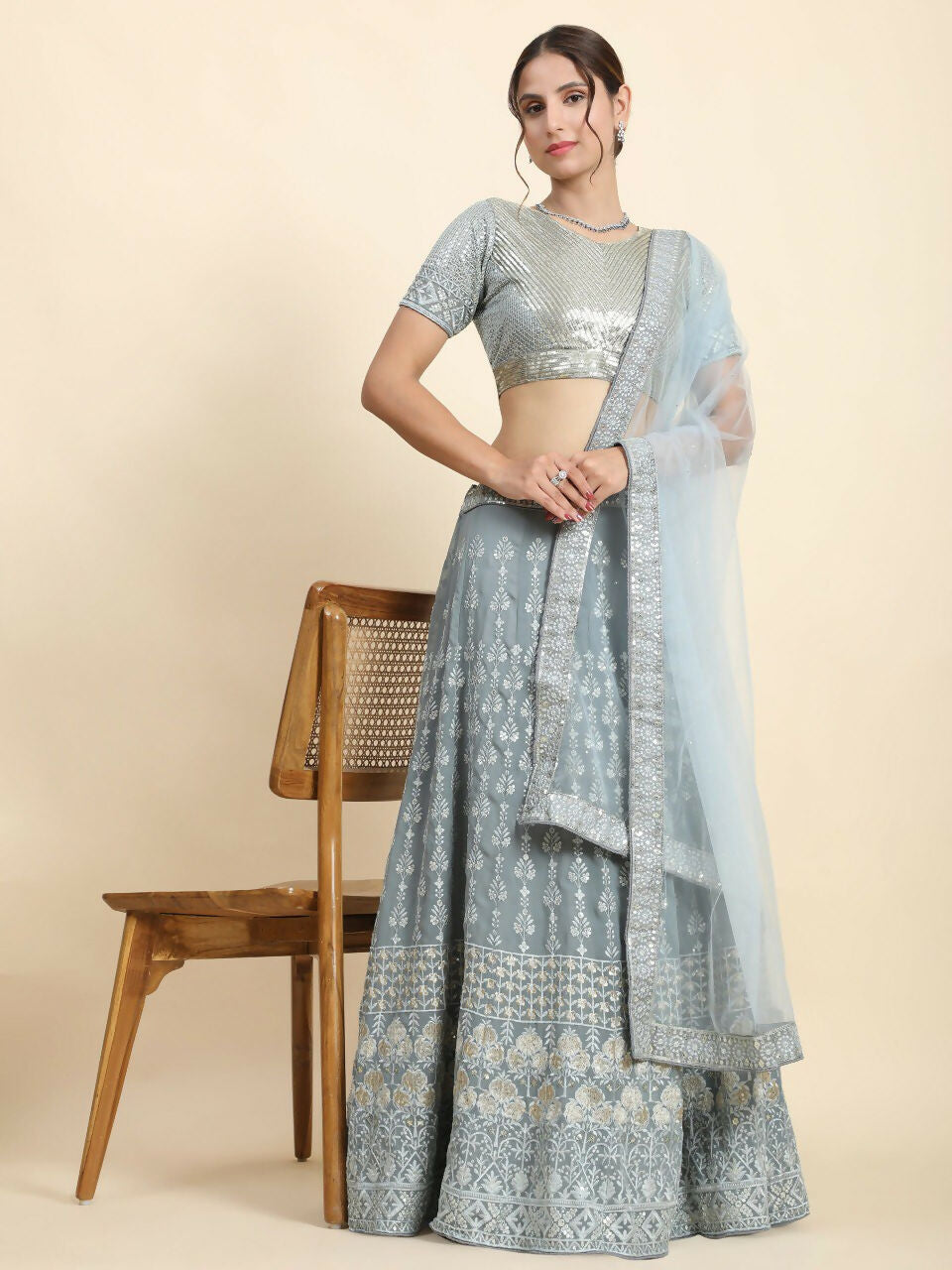 Grey georgette lehenga choli with intricate sequins and zari embroidery