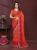 Stunning orange georgette saree adorned with a detailed digital print.