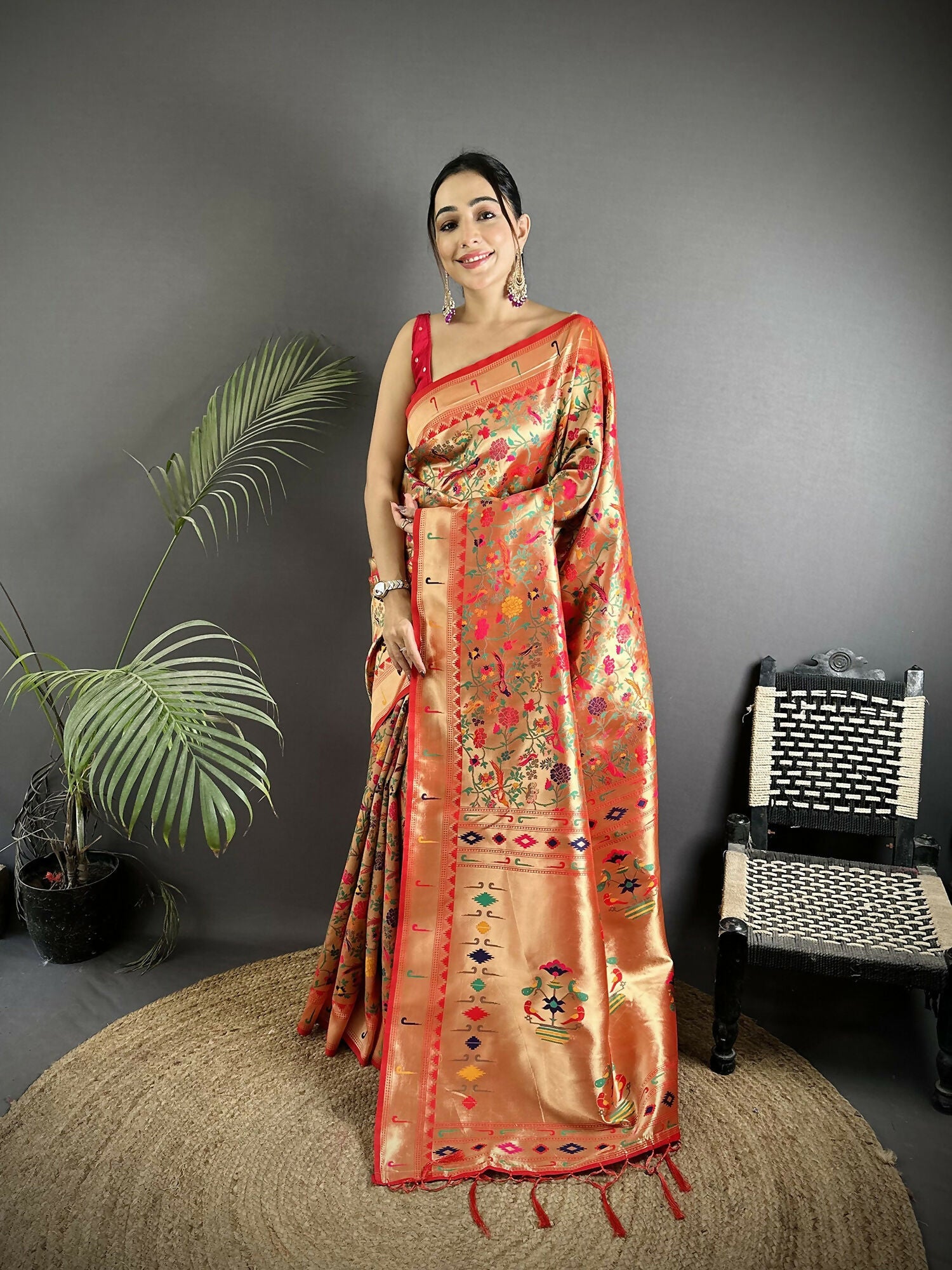Red soft silk Paithani saree with bird and floral motif detailing