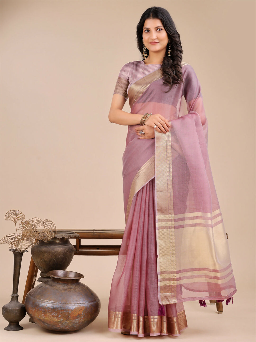 Lightweight Seoul purple organza saree with elegant, airy drape