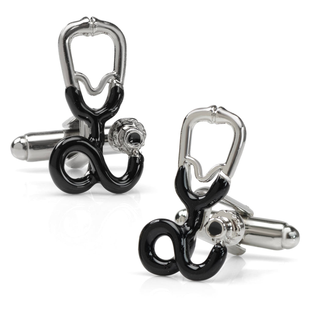 Silver and black stethoscope shaped cufflinks displayed on a white surface