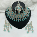 Exquisite blue stone work necklace and matching earring set displayed against a neutral background