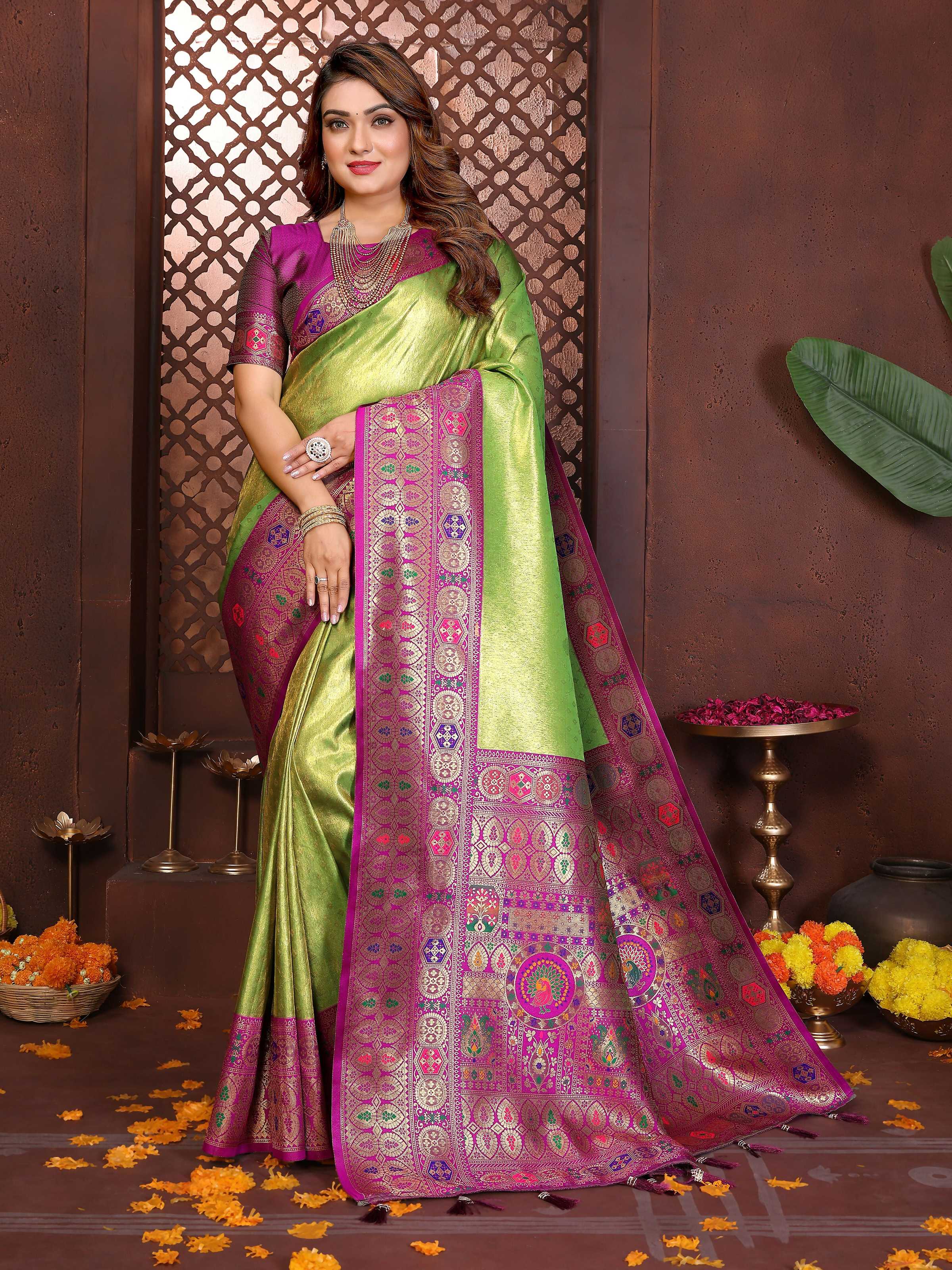 Green tissue silk saree with weaving details and a metallic sheen