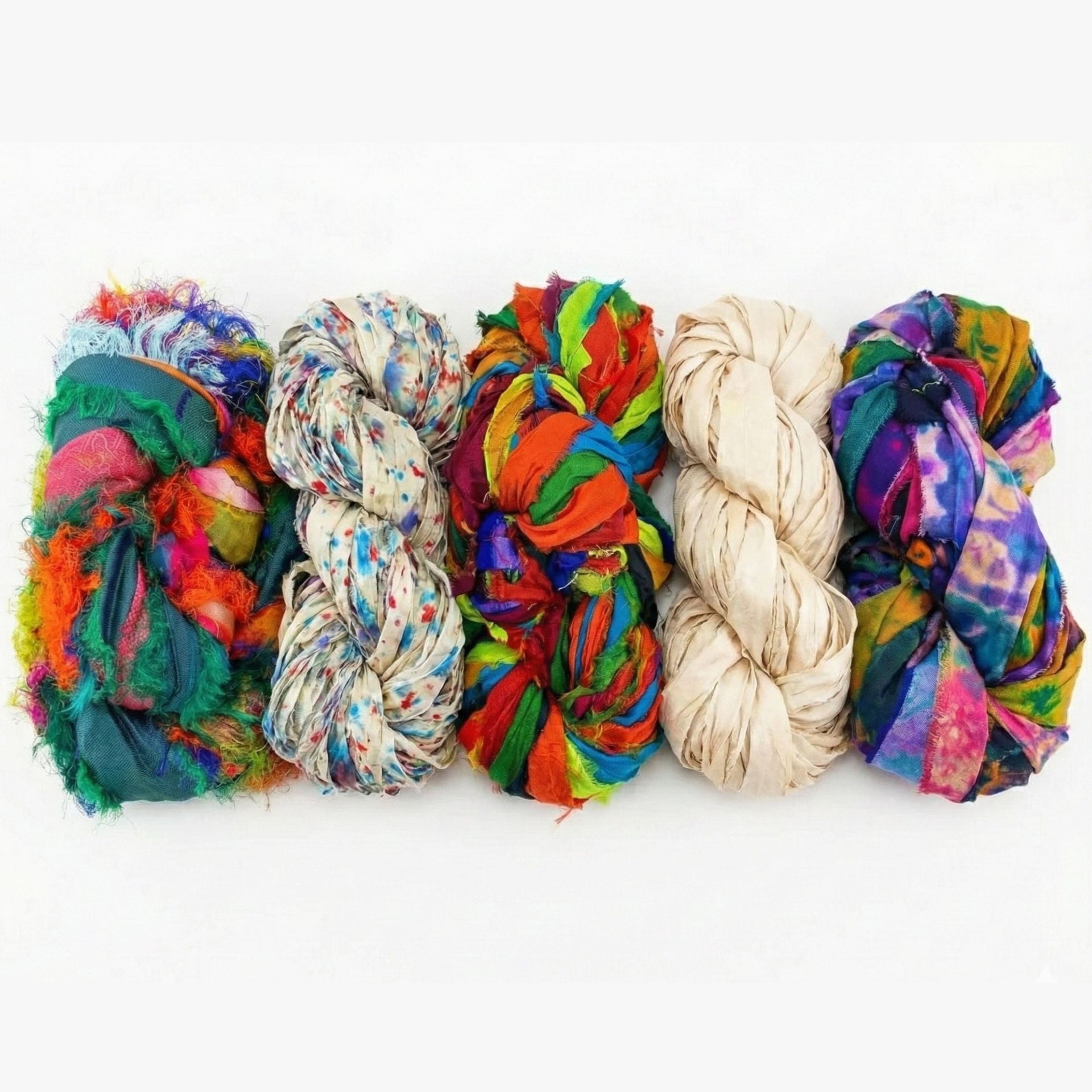 Colorful DIY craft kit with recycled sari silk ribbon skeins for making a bohemian storage basket