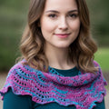 Close-up of a beginner-friendly textured knit triangle shawl in a soft, elegant drape.