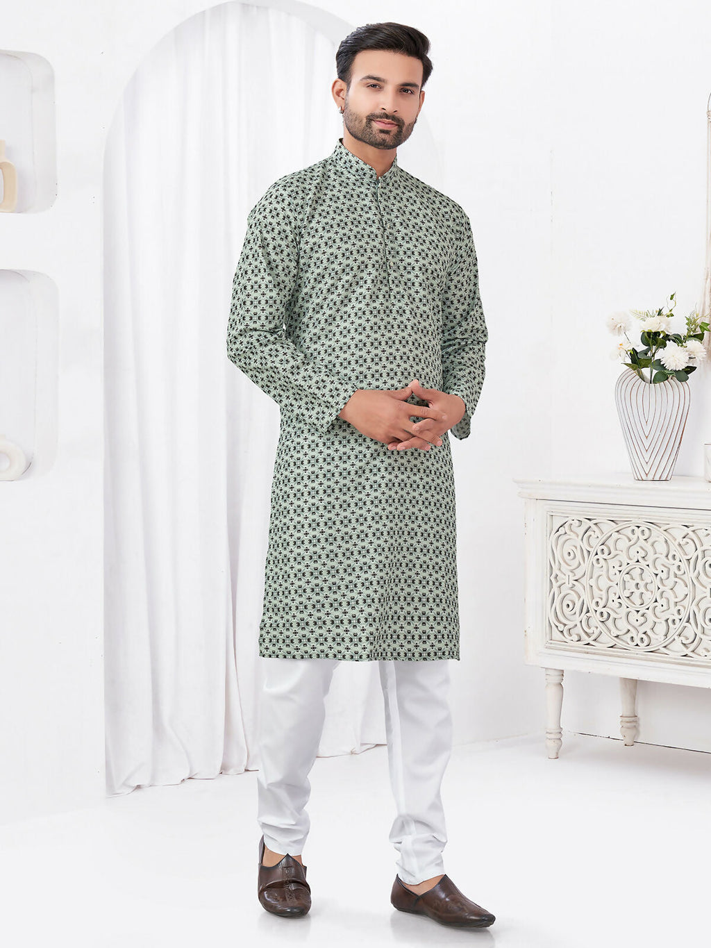 A toddler wearing a grey rayon-cotton printed kurta pyjama set for a casual ethnic look.