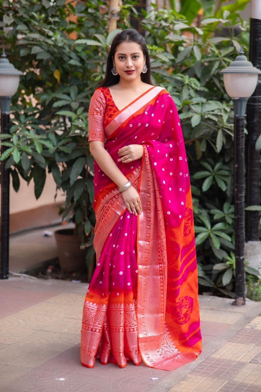 Rani magenta and orange jute silk saree with Bandez print and cut broaso border
