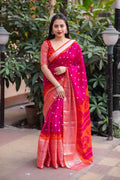 Rani magenta and orange jute silk saree with Bandez print and cut broaso border