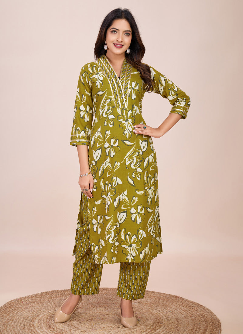 Woman wearing a Mahendi printed cotton blend kurta and matching pant set