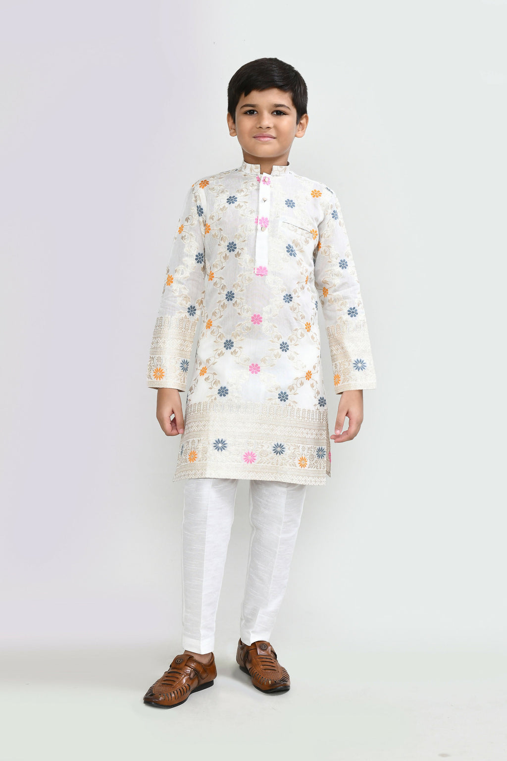 Off white silk kurta for men paired with straight fit white pants