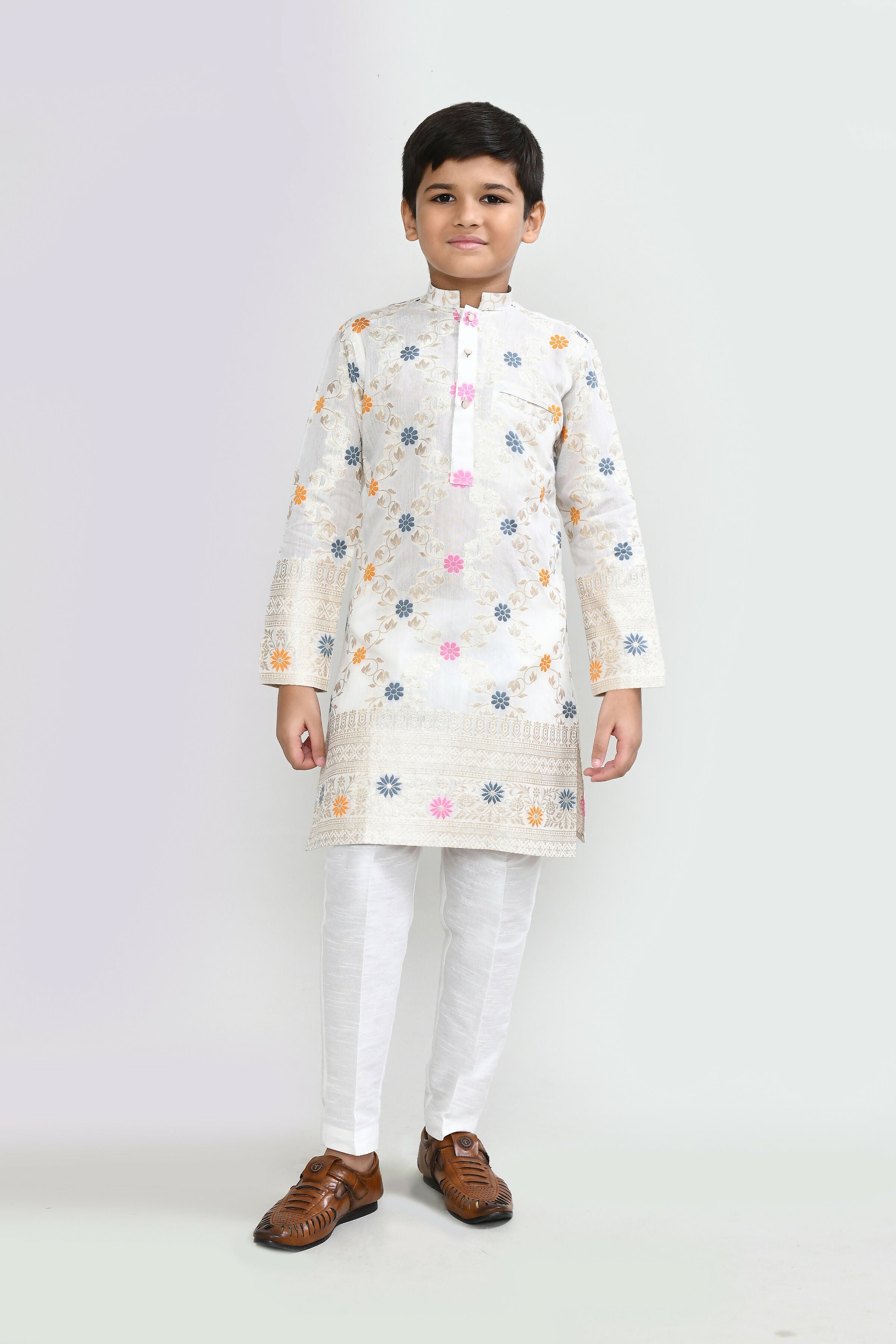 Off white silk kurta for men paired with straight fit white pants
