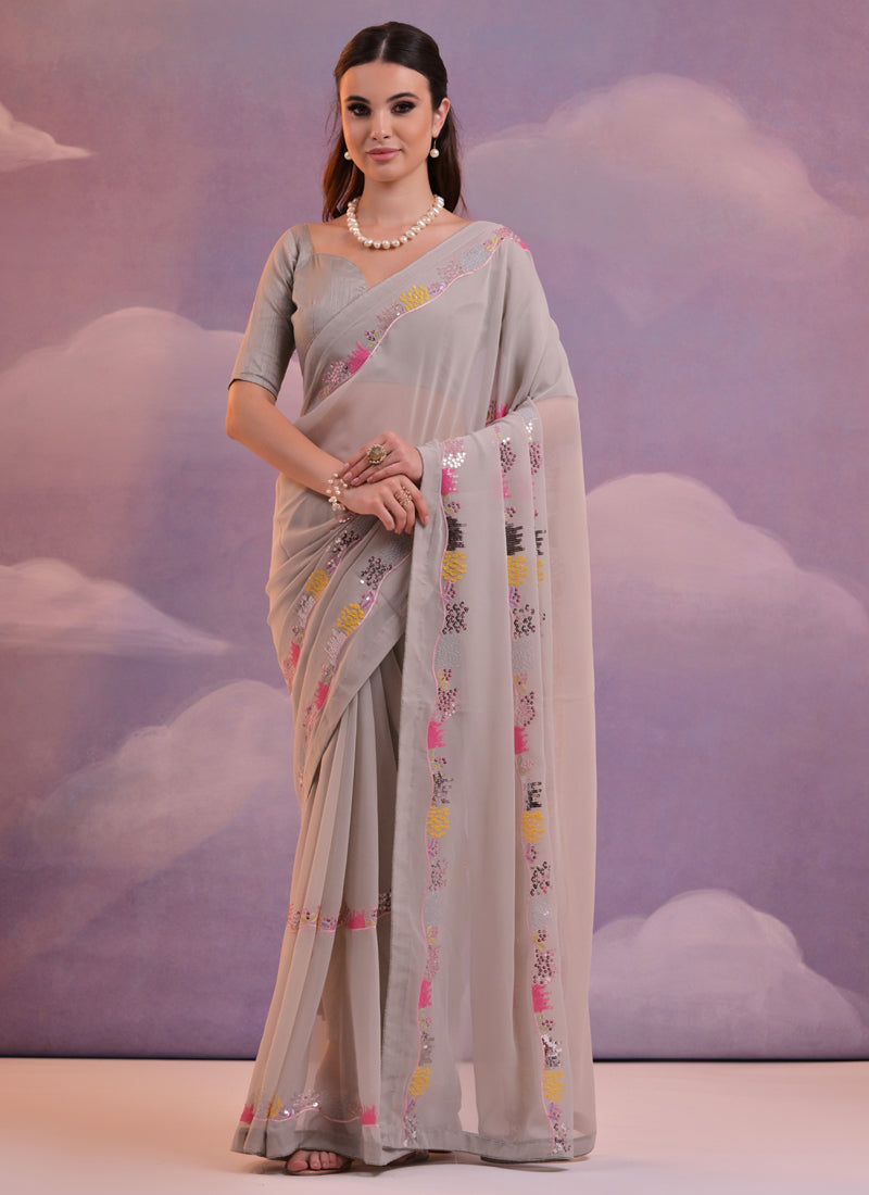 Beige georgette saree with elegant embroidered sequence work and matching blouse piece