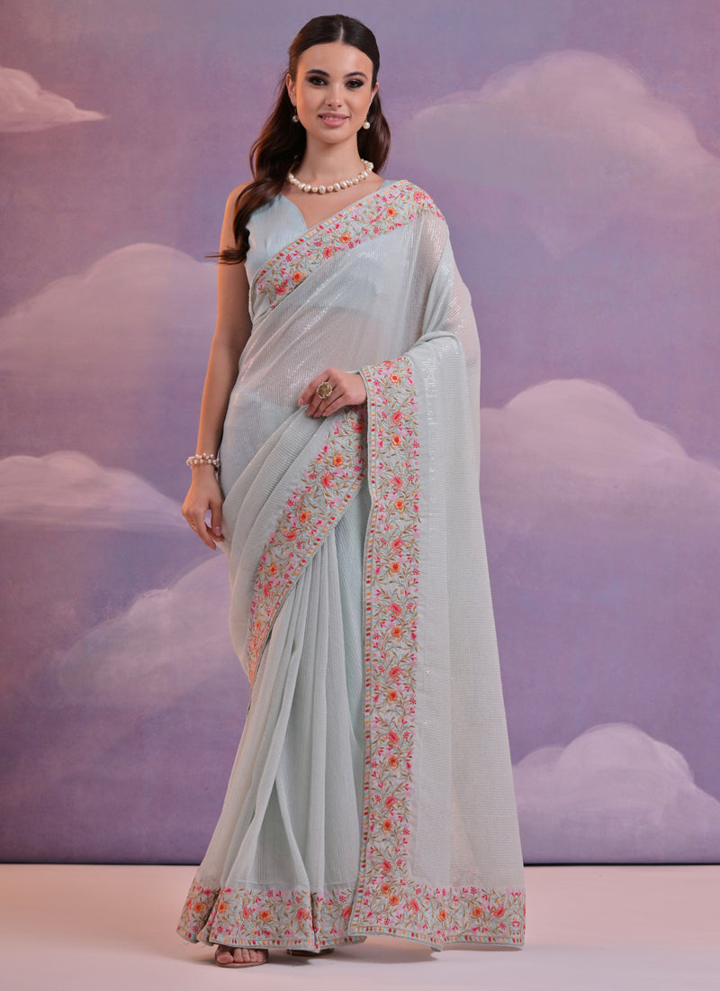 Light grey georgette saree featuring floral embroidered sequence detailing