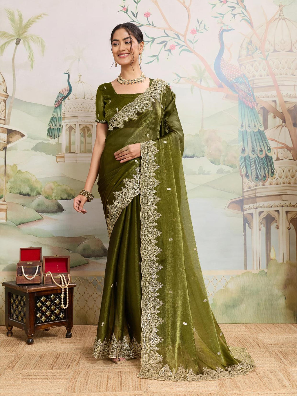 Green embroidered Jimmy Choo Organza party wear saree with unstitched blouse
